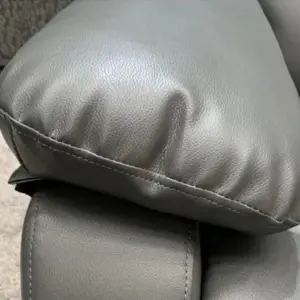 : Roma recliner sofa armrest close-up with soft leather padding