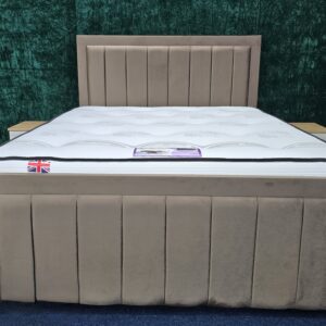 Modern beige velvet bed with chrome legs and vertical panel design