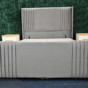 Side view of beige velvet vertical panel bed frame with soft upholstery